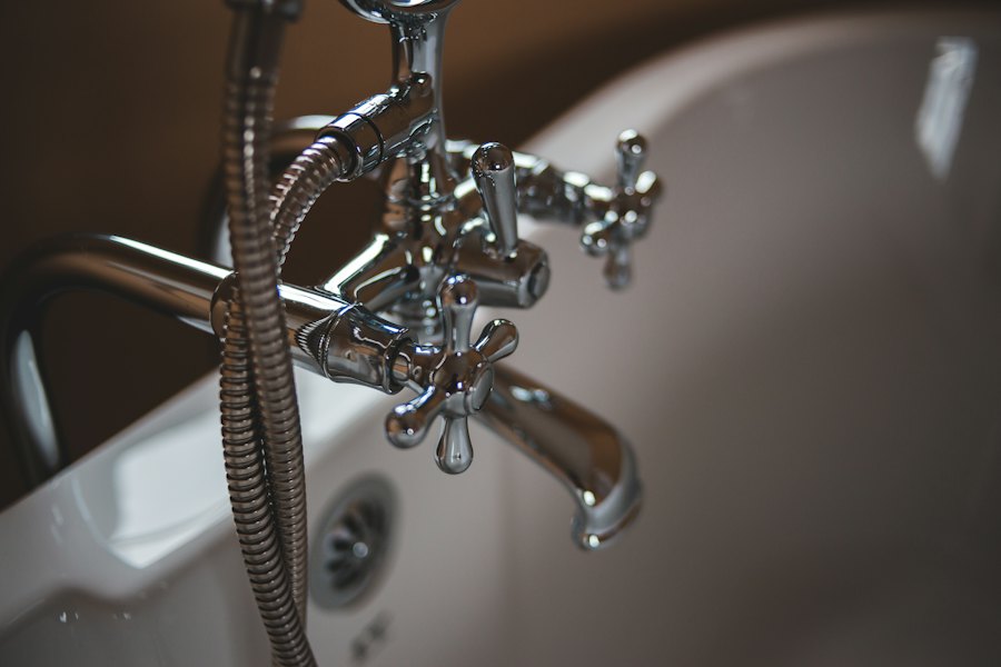 Polished chrome bathtub faucet after fixture install