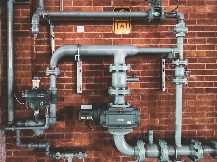 Mechanical piping on a brick wall